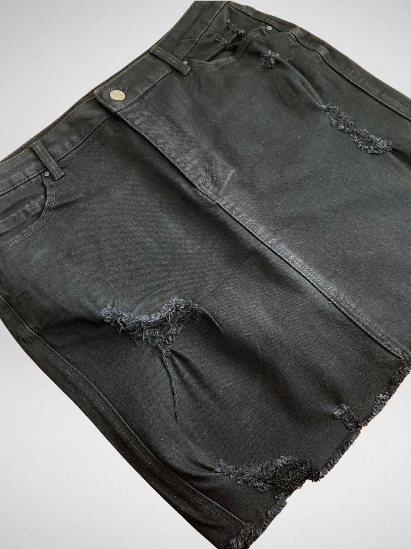 On The Edge Plus Size Denim Mini Skirt